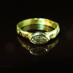 Engagement ring. 14K solid Yellow gold ring set with 0.25ct Marquise diamond.